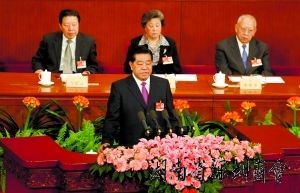 贾庆林:推进收入分配制度改革(图)